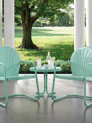 Two outdoor chairs online and table