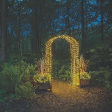 Jardin Rose Obelisk with Coir Planters lit up with Battery Operated Fairy Lights in outdoor area