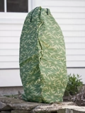 ShrubJacket Cover over plant in garden bed