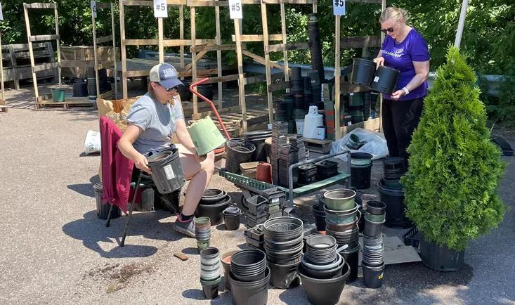 Black Plastic Pots being sorted