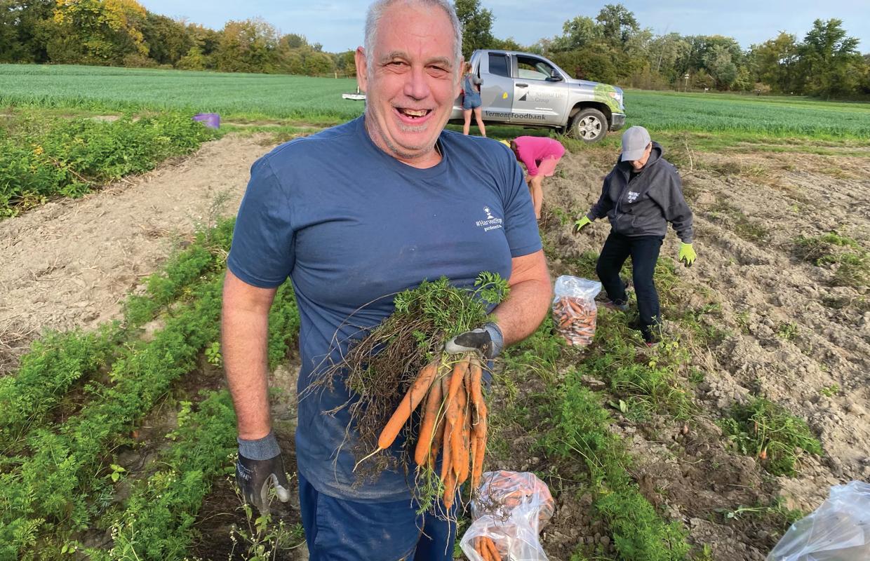 employee owner gleaning carrots